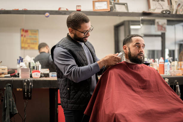 barber cutting client's hair
